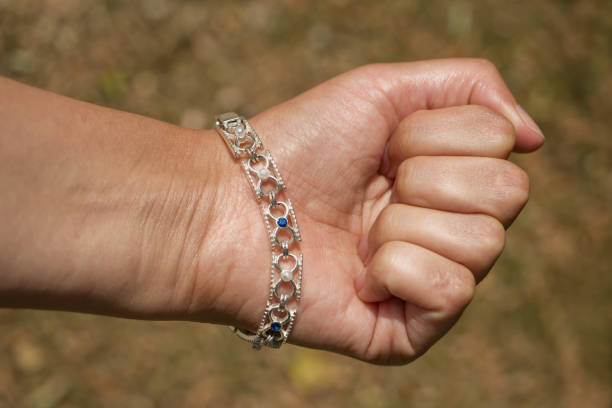 Clenched woman´s fist with blured background